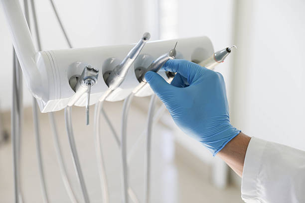 Professional Tooth Extraction technician working in Lemoore Station, CA
